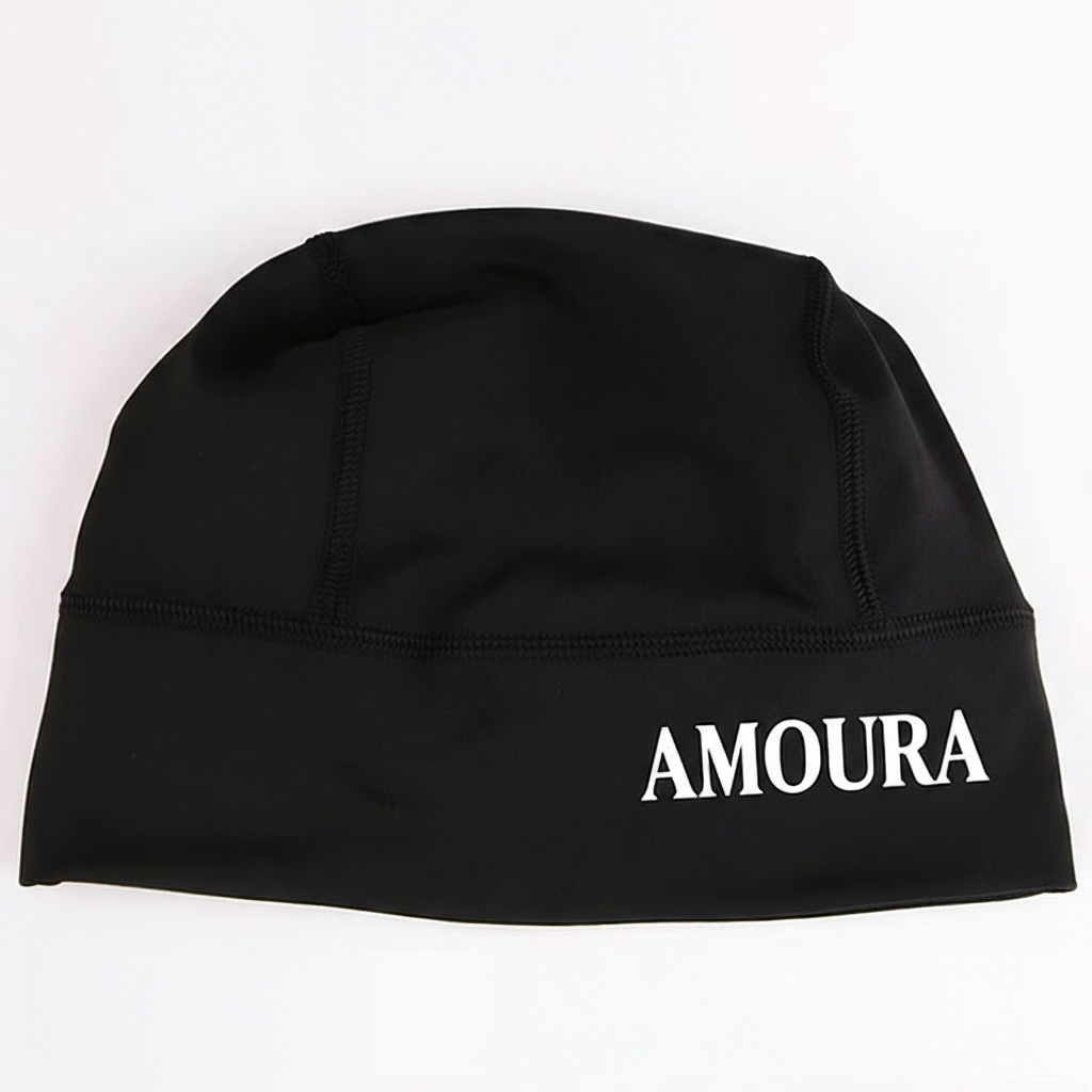 Black swim cap with 'AMOURA' logo on a white background